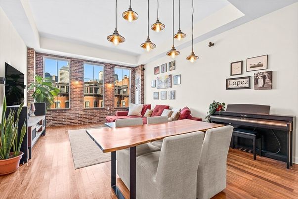 Dining room, Interior, Pendant Lights, Piano, Stone Walls, Wood Texture Flooring
