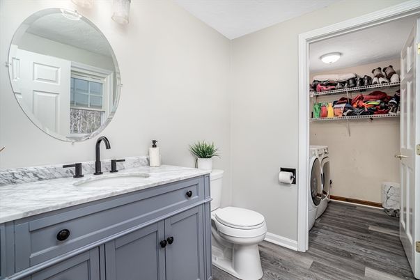 Bathroom, Dual Sink Vanities, Interior, Washer, Wood Texture Flooring