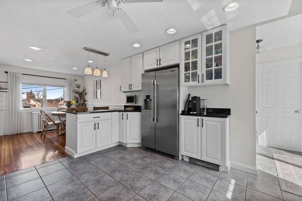 Dining room, Interior, Kitchen, Pendant Lights, Recessed Lighting, Stainless Steel Appliances, Wood Texture Flooring