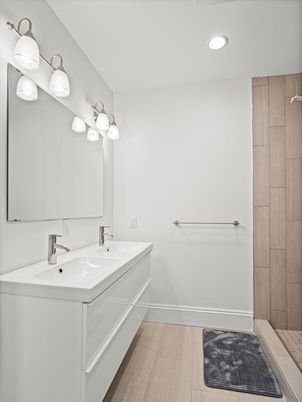 Bathroom, Dual Sink Vanities, Interior, Recessed Lighting, Wood Texture Flooring