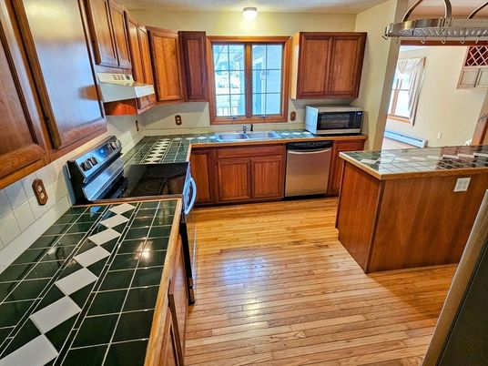 Interior, Kitchen, Tile Countertops, Wood Texture Flooring