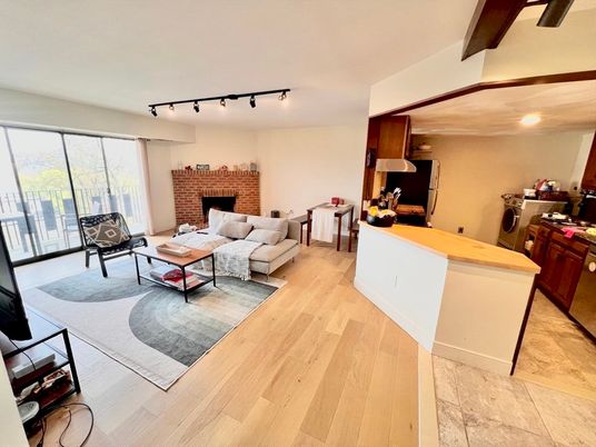 Fireplace, Interior, Kitchen, Living room, Recessed Lighting, Stone Walls, Wood Texture Flooring