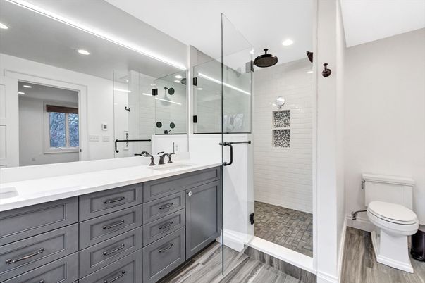 Bathroom, Dual Sink Vanities, Glass Shower, Interior, Recessed Lighting, Wood Texture Flooring