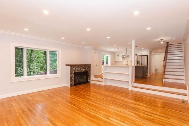 Empty room, Fireplace, Interior, Kitchen, Pendant Lights, Recessed Lighting, Wood Texture Flooring
