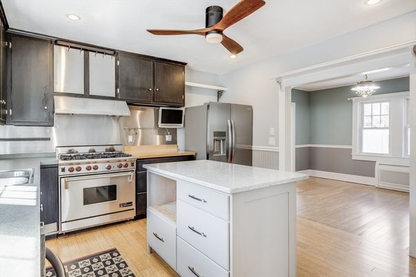 Chandelier, Interior, Kitchen, Recessed Lighting, Stainless Steel Appliances, Wood Texture Flooring