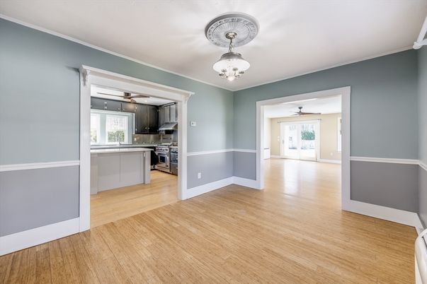 Empty room, Interior, Kitchen, Stainless Steel Appliances, Wood Texture Flooring