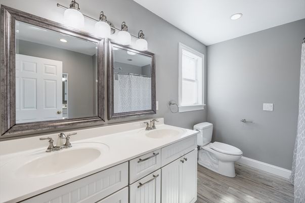 Bathroom, Dual Sink Vanities, Interior, Recessed Lighting, Wood Texture Flooring