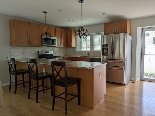 Interior, Kitchen, Pendant Lights, Recessed Lighting, Stainless Steel Appliances, Wood Texture Flooring