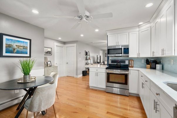 Dining room, Interior, Kitchen, Recessed Lighting, Stainless Steel Appliances, Wood Texture Flooring