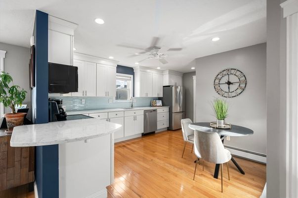 Dining room, Interior, Kitchen, Recessed Lighting, Stainless Steel Appliances, Wood Texture Flooring