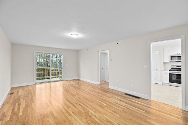 Empty room, Interior, Kitchen, Stainless Steel Appliances, Wood Texture Flooring