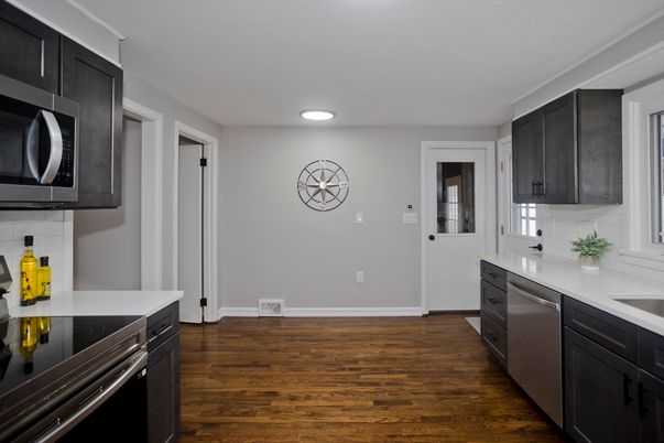 Interior, Kitchen, Recessed Lighting, Stainless Steel Appliances, Wood Texture Flooring