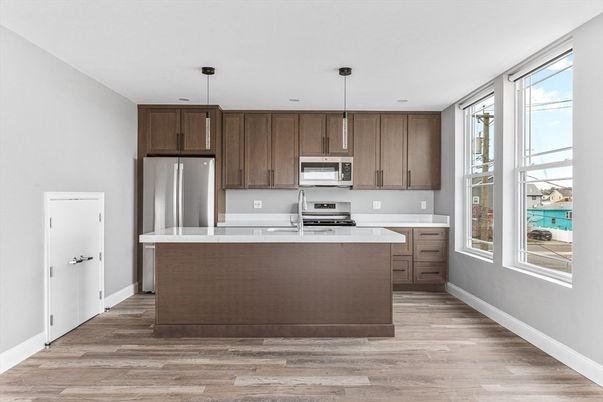 Interior, Kitchen, Pendant Lights, Recessed Lighting, Stainless Steel Appliances, Wood Texture Flooring
