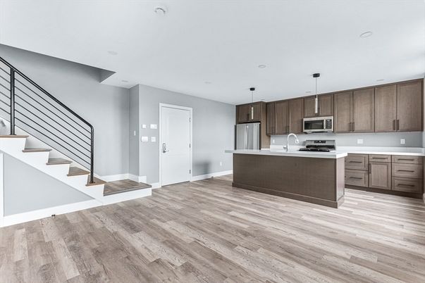 Interior, Kitchen, Pendant Lights, Recessed Lighting, Stainless Steel Appliances, Wood Texture Flooring