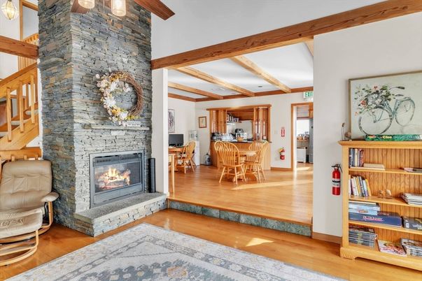 Dining room, Fireplace, Interior, Stone Walls, Wooden Beams, Wood Texture Flooring