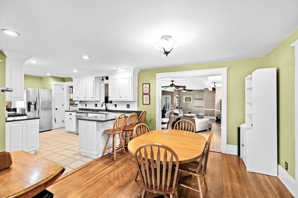 Dining room, Interior, Kitchen, Living room, Recessed Lighting, Stainless Steel Appliances, Wood Texture Flooring