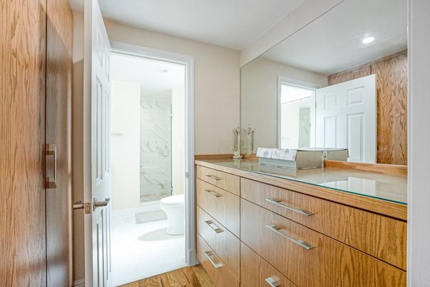 Bathroom, Glass Shower, Interior, Marble, Marble Walls, Recessed Lighting, Wood Texture Flooring