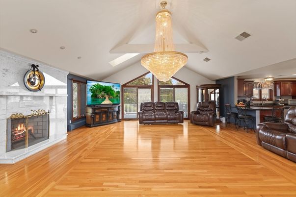 Chandelier, Fireplace, Interior, Kitchen, Recessed Lighting, Wood Texture Flooring