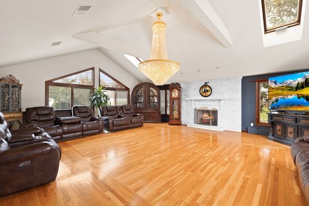 Chandelier, Fireplace, Interior, Living room, Recessed Lighting, Wood Texture Flooring