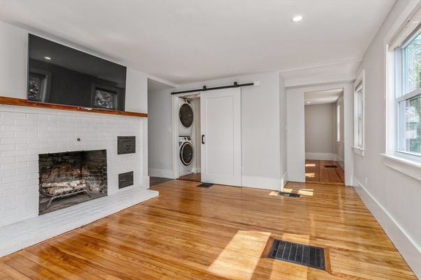 Fireplace, Interior, Recessed Lighting, Washer, Wood Texture Flooring