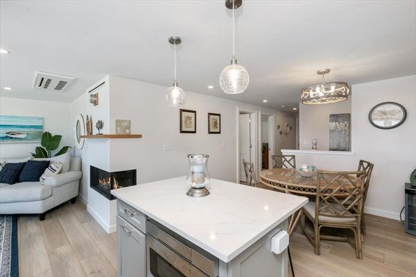 Dining room, Fireplace, Interior, Kitchen, Living room, Pendant Lights, Recessed Lighting, Wood Texture Flooring
