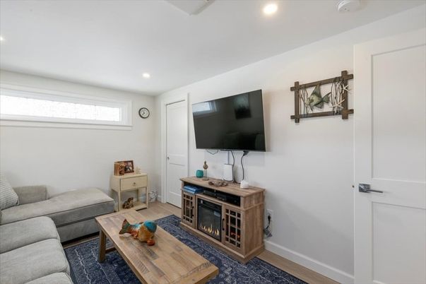 Fireplace, Interior, Living room, Recessed Lighting, Wood Texture Flooring