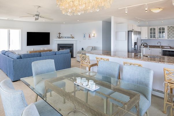Chandelier, Dining room, Fireplace, Interior, Kitchen, Living room, Recessed Lighting, Stainless Steel Appliances