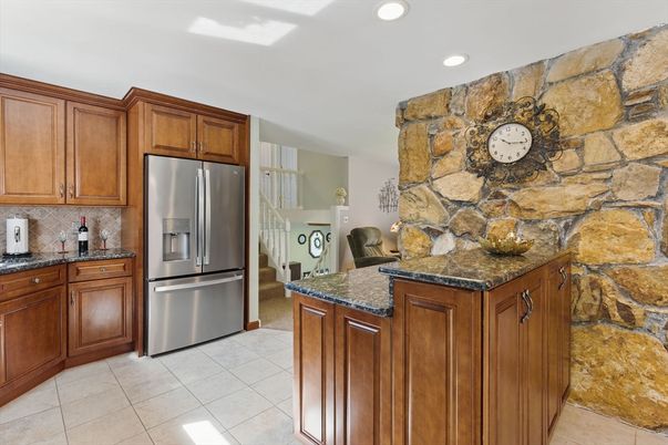 Interior, Kitchen, Recessed Lighting, Stainless Steel Appliances, Stone Walls
