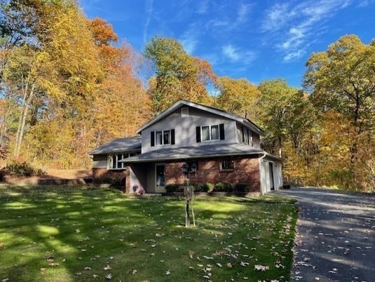 Attached, Backyard, Exterior, Facade, Brick Facade, Split Level