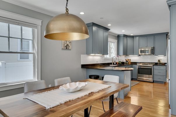 Dining room, Interior, Kitchen, Pendant Lights, Recessed Lighting, Stainless Steel Appliances, Wood Texture Flooring