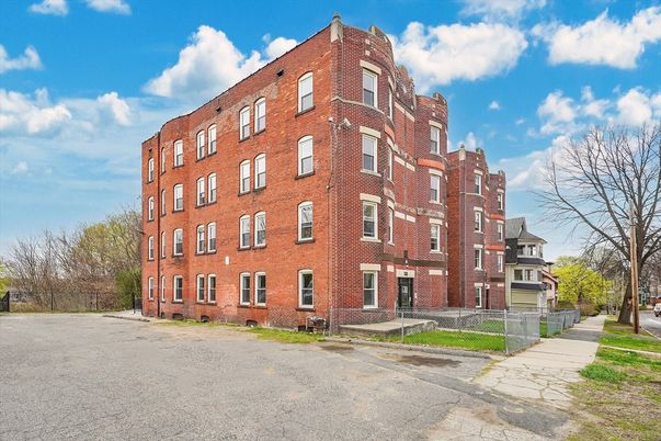 Exterior, Facade, Brick Facade, Condo Building