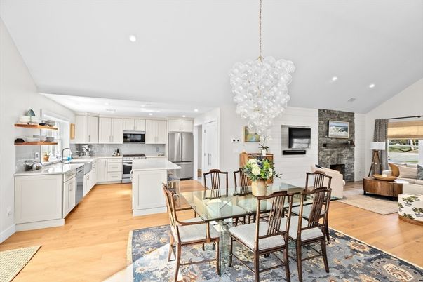 Dining room, Fireplace, Interior, Kitchen, Pendant Lights, Recessed Lighting, Stainless Steel Appliances, Wood Texture Flooring