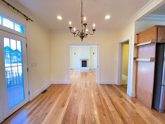 Chandelier, Empty room, Fireplace, Interior, Recessed Lighting, Wood Texture Flooring