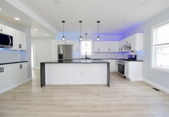 Interior, Kitchen, Pendant Lights, Recessed Lighting, Stainless Steel Appliances, Wood Texture Flooring
