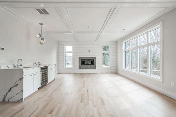 Empty room, Fireplace, Interior, Kitchen, Pendant Lights, Recessed Lighting, Wood Texture Flooring