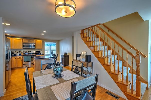 Dining room, Interior, Kitchen, Recessed Lighting, Stainless Steel Appliances, Wood Texture Flooring