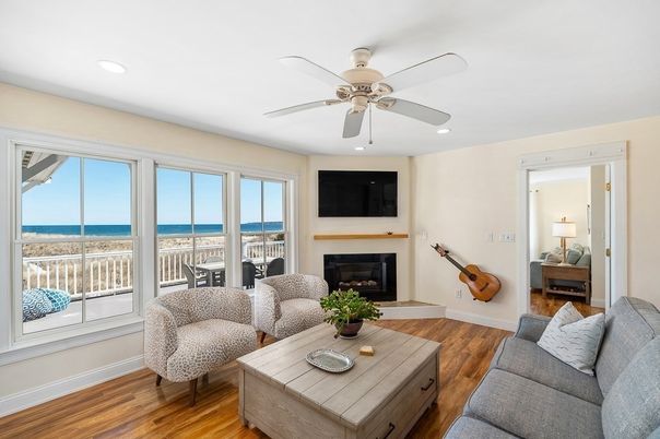 Fireplace, Interior, Living room, Recessed Lighting, Water, Wood Texture Flooring