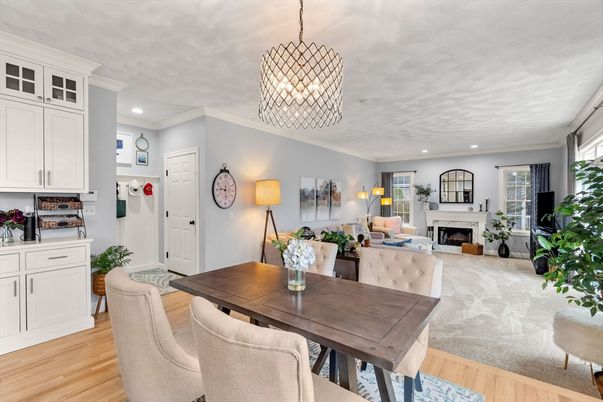 Dining room, Fireplace, Interior, Living room, Pendant Lights, Recessed Lighting, Wood Texture Flooring
