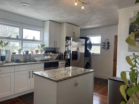 Interior, Kitchen, Recessed Lighting, Washer, Wood Texture Flooring