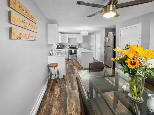 Chandelier, Dining room, Interior, Kitchen, Stainless Steel Appliances, Wood Texture Flooring
