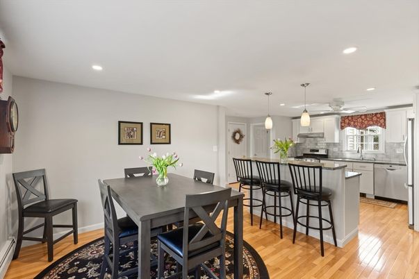 Dining room, Interior, Kitchen, Pendant Lights, Recessed Lighting, Stainless Steel Appliances, Wood Texture Flooring