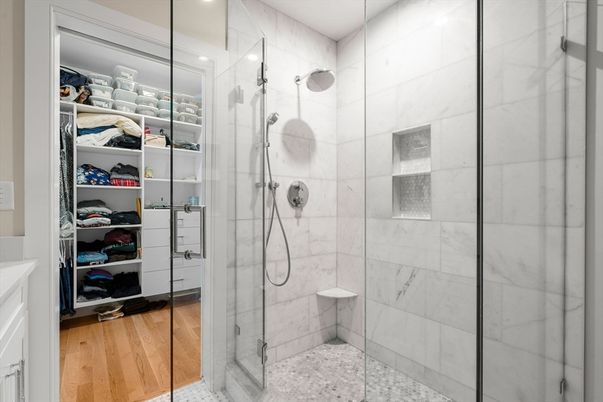 Bathroom, Glass Shower, Interior, Marble Walls, Recessed Lighting, Wood Texture Flooring