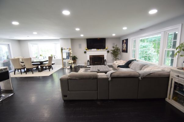 Dining room, Fireplace, Interior, Living room, Recessed Lighting, Wood Texture Flooring