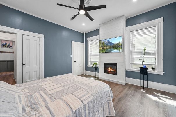Bedroom, Fireplace, Interior, Recessed Lighting, Wood Texture Flooring
