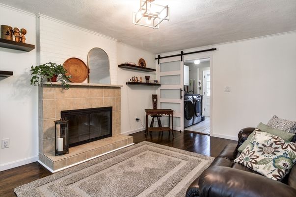 Fireplace, Interior, Washer, Wood Texture Flooring