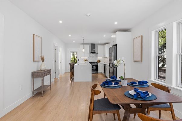 Dining room, Interior, Kitchen, Pendant Lights, Recessed Lighting, Stainless Steel Appliances, Wood Texture Flooring