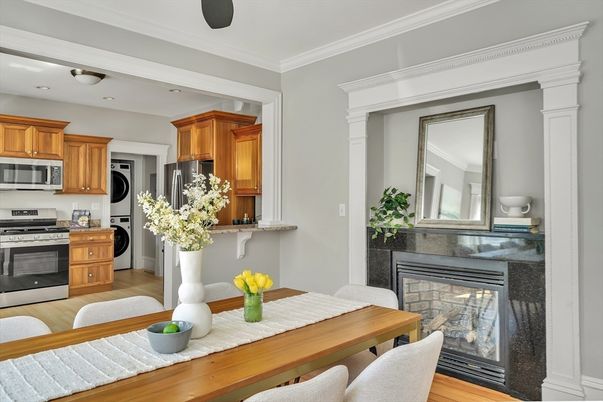 Dining room, Fireplace, Interior, Kitchen, Stainless Steel Appliances, Wood Texture Flooring