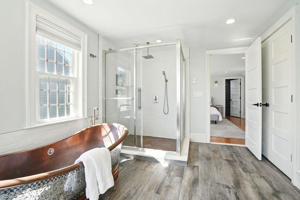 Bathroom, Bedroom, Glass Shower, Interior, Recessed Lighting, Wood Texture Flooring