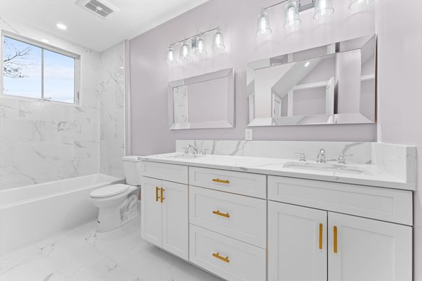 Bathroom, Dual Sink Vanities, Interior, Marble, Marble Walls, Recessed Lighting