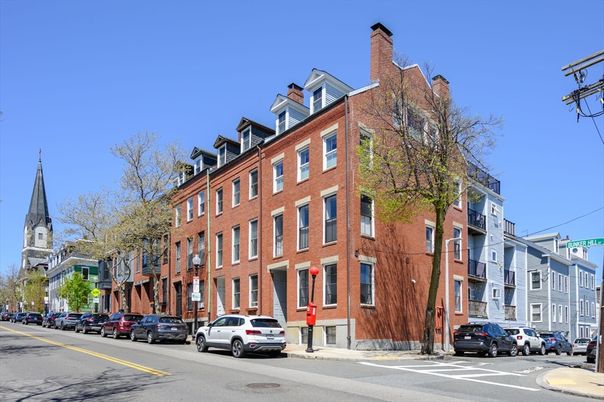 Exterior, Facade, Brick Facade, Condo Building